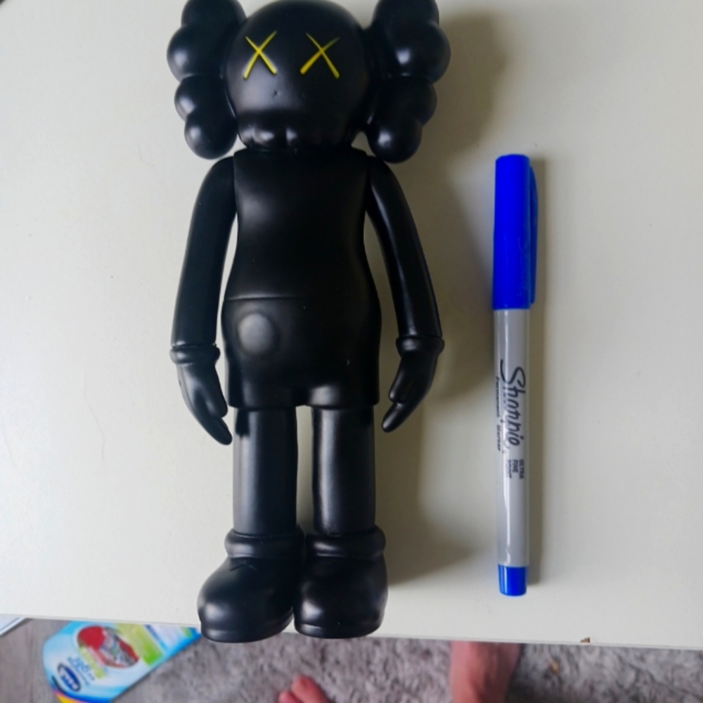 Authentic 2004 black Kaws Companion figure.